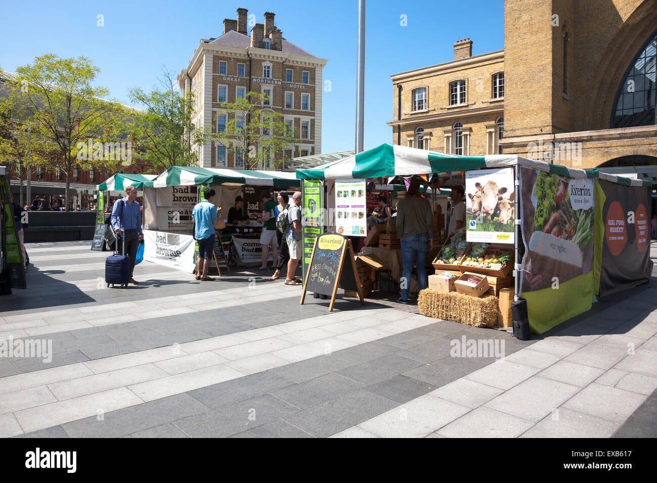 Real Food Market stalls in front of King's Cross station, London, England Stock Photo