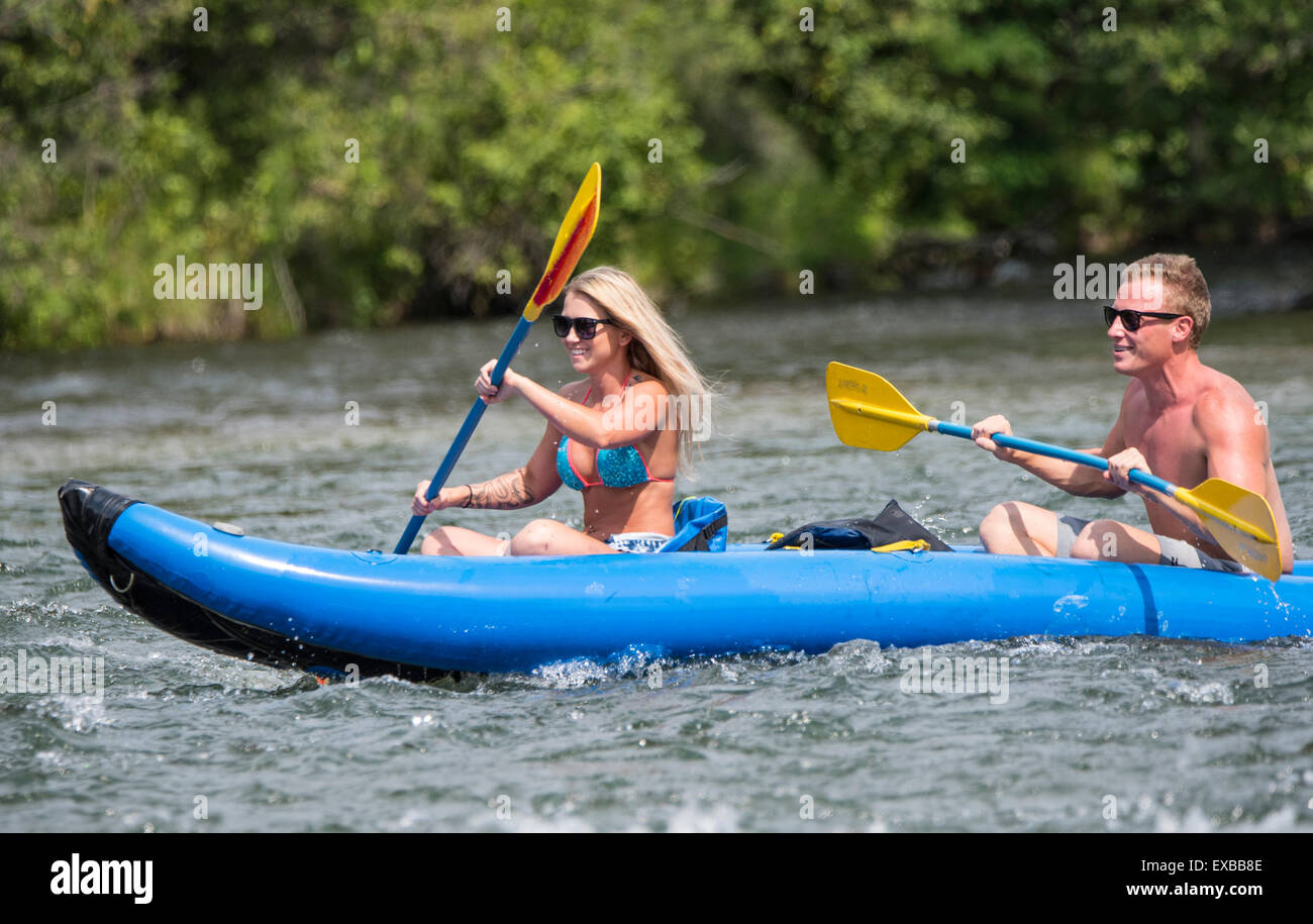 Floating the Boise River. Man and woman having fun Kayaking the Boise River. Boise, Idaho, USA Stock Photo