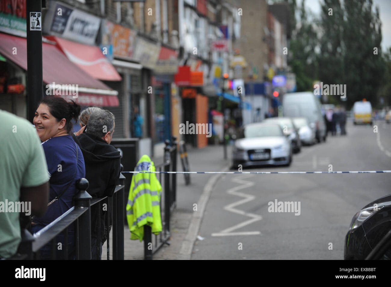 Wood Green, London, UK. July 2015. Police officers and scene of the crime officers attend the double shooting in North London Stock Photo