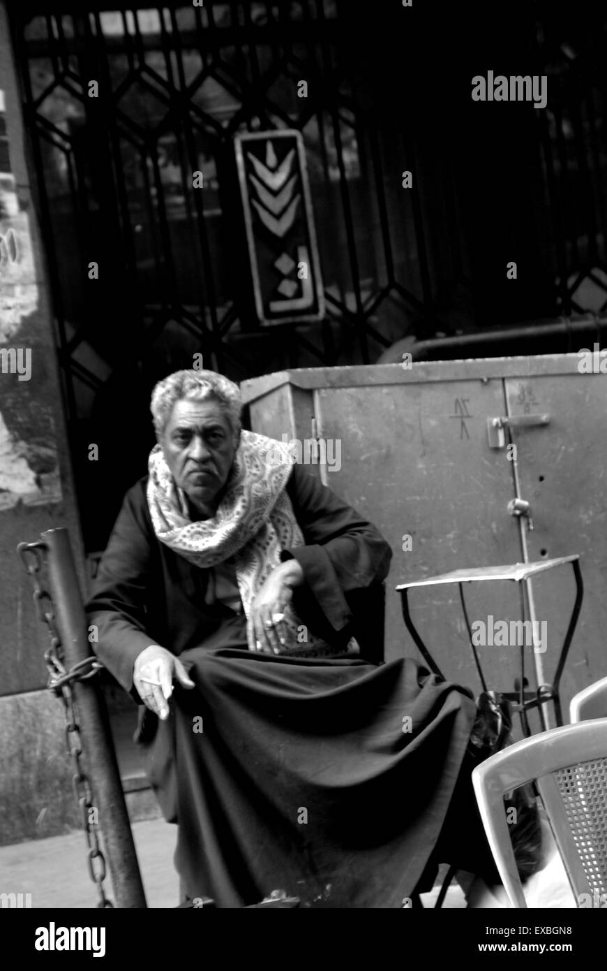 Arab man sitting in Cairo street Stock Photo