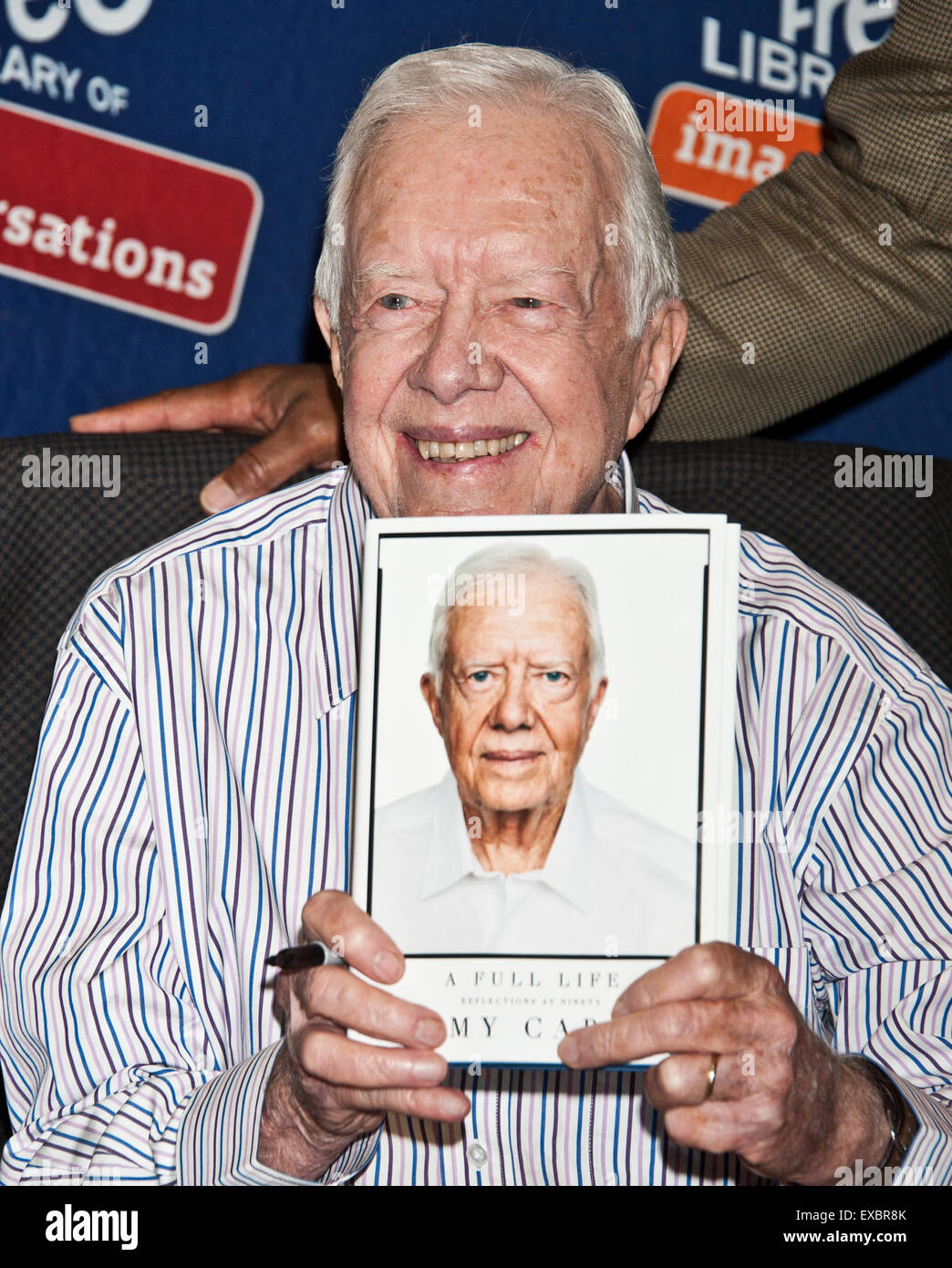 Philadelphia, Pennsylvania, USA. 10th July, 2015. Former President Jimmy Carter Signs His New Book 'A Full Life: Reflections at Ninety' at The Free Library of Philadelphia on July 10, 2015 in Philadelphia, Pennsylvania, United States. Credit:  Paul Froggatt/Alamy Live News Stock Photo