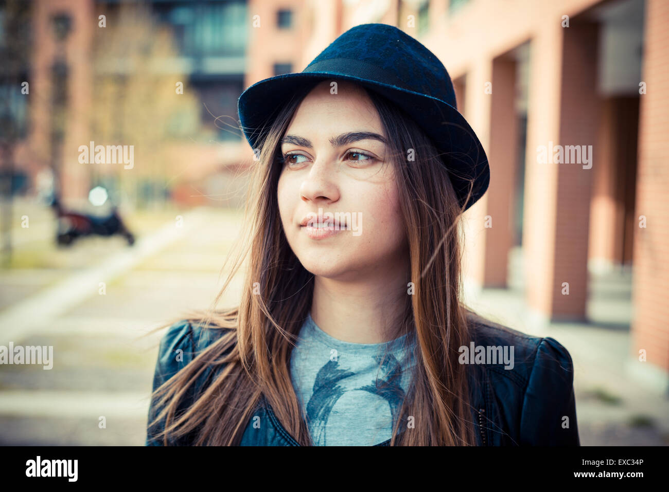 Positive young brunette woman hi-res stock photography and images - Alamy
