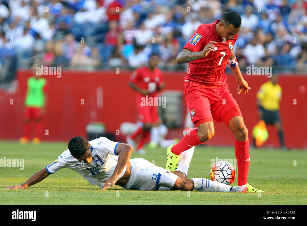 July 10, 2015; Foxborough, MA, USA; Honduras midfielder Jorge Claros (20) and Panama forward Blas Perez (7) in action during the second half of the CONCACAF Gold Cup match between Panama and Honduras at Gillette Stadium. The match ended in a 1-1 tie. Anthony Nesmith/Cal Sport Media Stock Photo