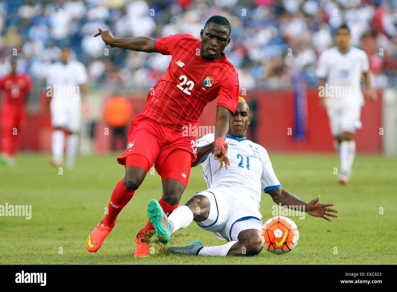 July 10, 2015; Foxborough, MA, USA; Panama forward Abdiel Arroyo (22) and Honduras defender Brayan Beckeles (21) in action during the second half of the CONCACAF Gold Cup match between Panama and Honduras at Gillette Stadium. The match ended in a 1-1 tie. Anthony Nesmith/Cal Sport Media Stock Photo