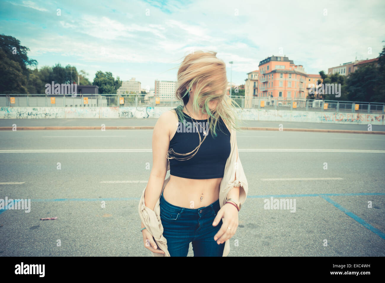 beautiful young blonde hair woman hipster in the city Stock Photo