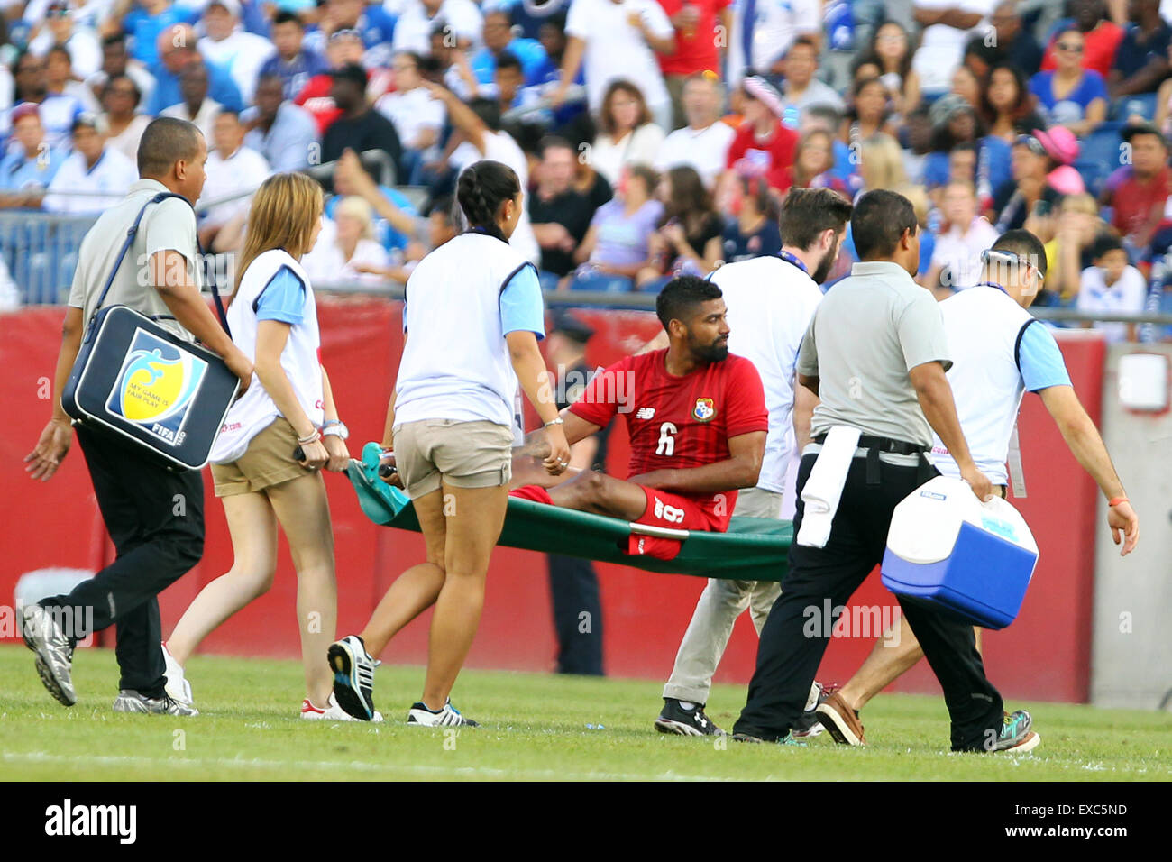 July 10, 2015; Foxborough, MA, USA; Panama midfielder Gabriel Gomez (6) is taken off the field on a stretcher during the second half of the CONCACAF Gold Cup match between Panama and Honduras at Gillette Stadium. The match ended in a 1-1 tie. Anthony Nesmith/Cal Sport Media Stock Photo