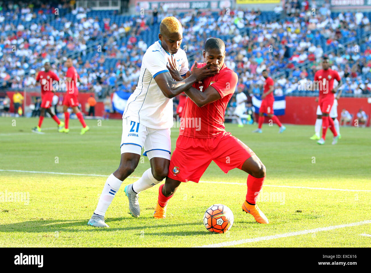 July 10, 2015; Foxborough, MA, USA; Honduras defender Brayan Beckeles (21) and Panama midfielder Armando Cooper (11) battle for the ball during the first half of the CONCACAF Gold Cup match between Panama and Honduras at Gillette Stadium. The match ended in a 1-1 tie. Anthony Nesmith/Cal Sport Media Stock Photo