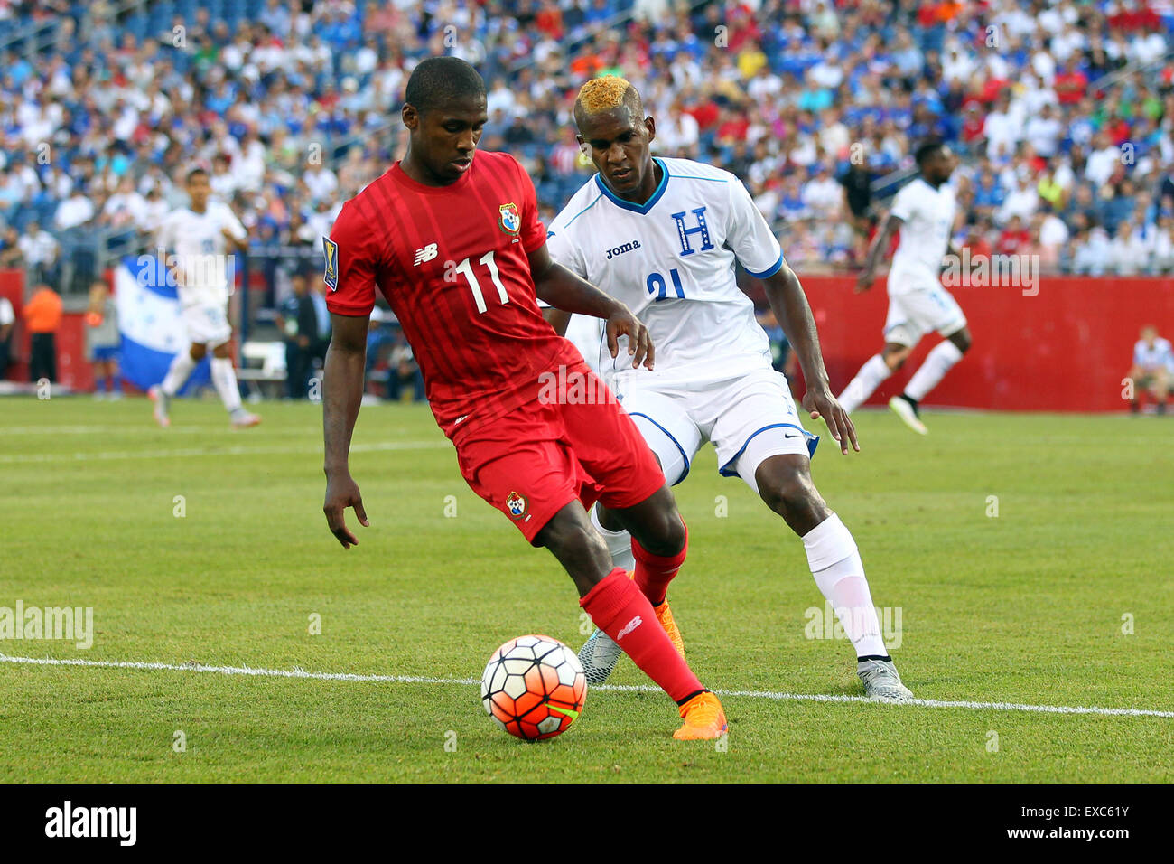 July 10, 2015; Foxborough, MA, USA; Panama midfielder Armando Cooper (11) and Honduras defender Brayan Beckeles (21) in action during the CONCACAF Gold Cup match between Panama and Honduras at Gillette Stadium. The match ended in a 1-1 tie. Anthony Nesmith/Cal Sport Media Stock Photo