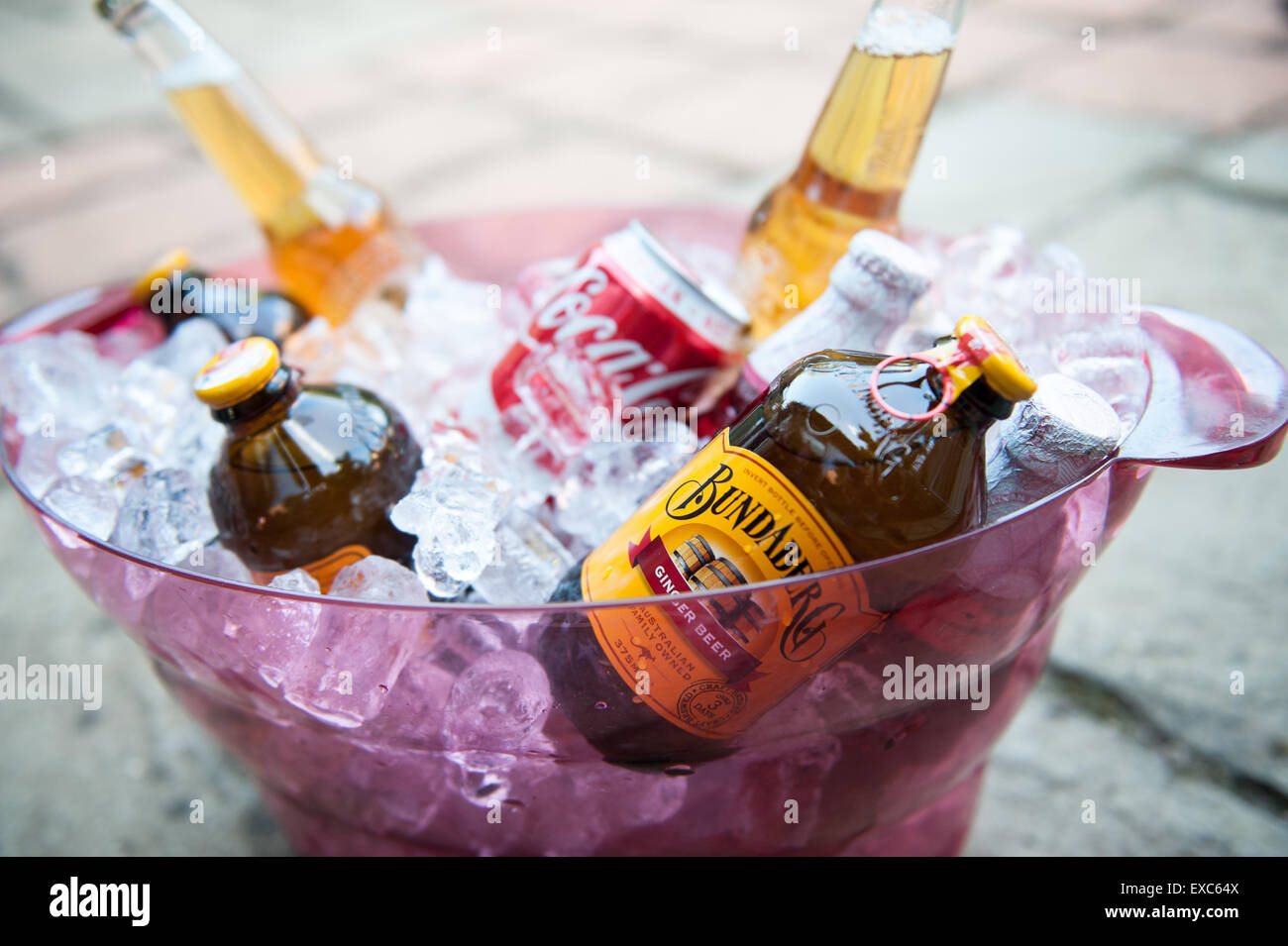 Variety of summer drinks cooling in an ice bucket Stock Photo