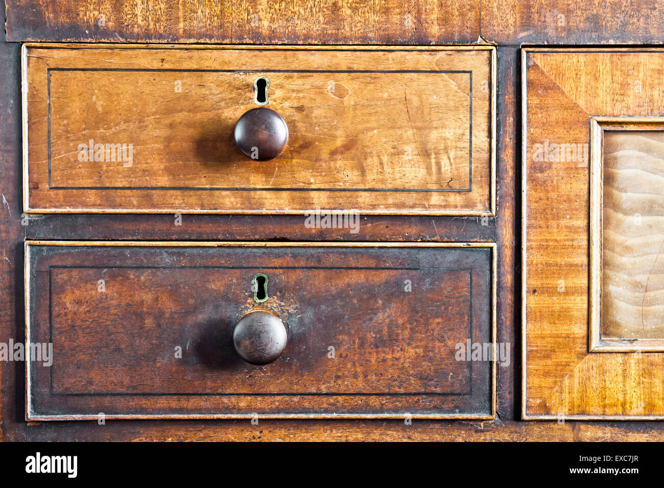 Part of an antique chest with wooden drawers Stock Photo