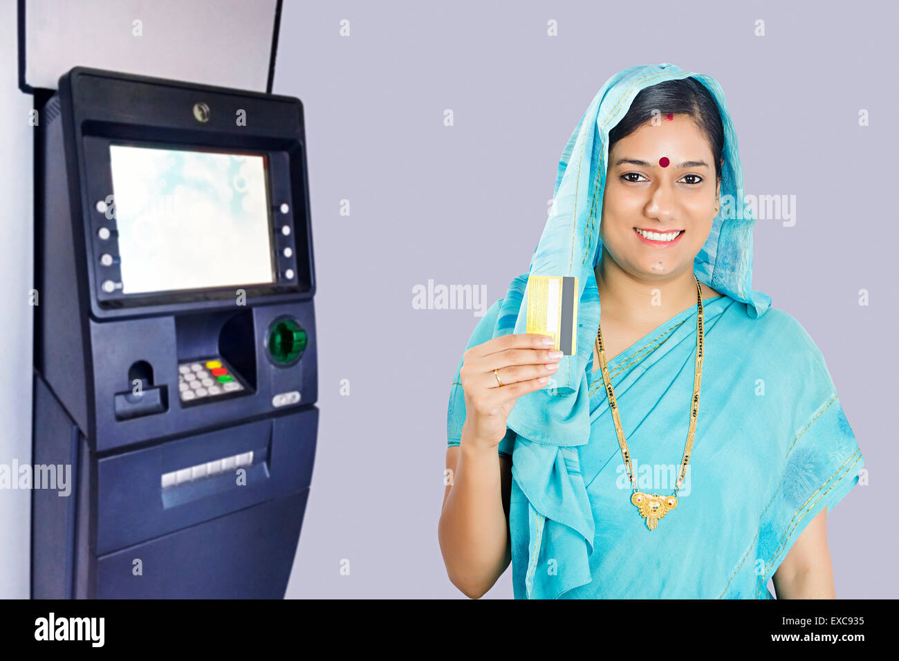 1 indian Rural woman Credit Card showing Stock Photo