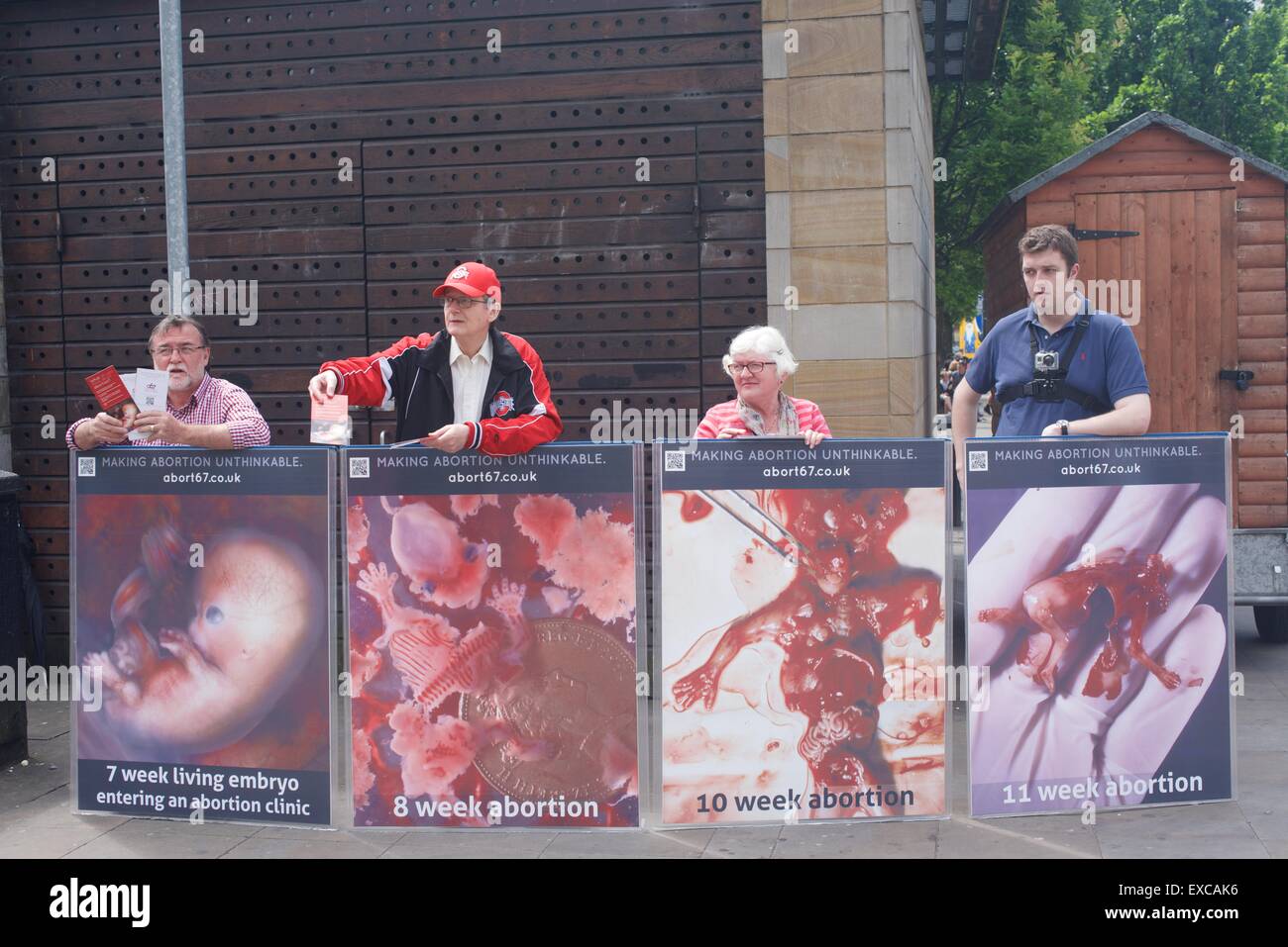 Manchester  UK  11th July 2015  Four members of Abort67 stand outside  Piccadilly Gardens giving out leaflets showing why abortion should not be allowed. Anti-Abortion Protest  Manchester UK Credit:  John Fryer/Alamy Live News Stock Photo