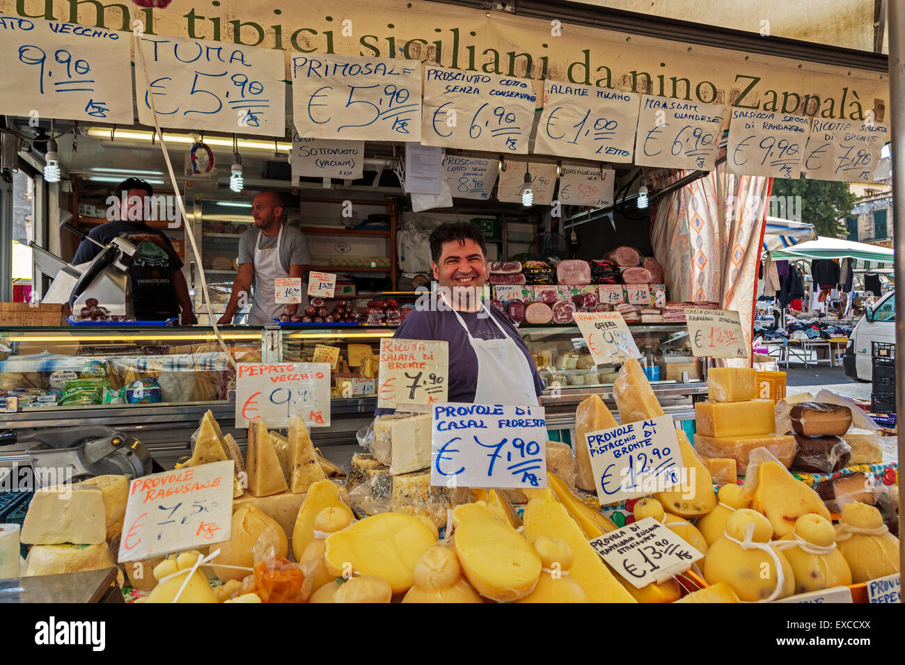 Cheese seller at Catania street market, Catania town, Sicily, Italy Stock Photo