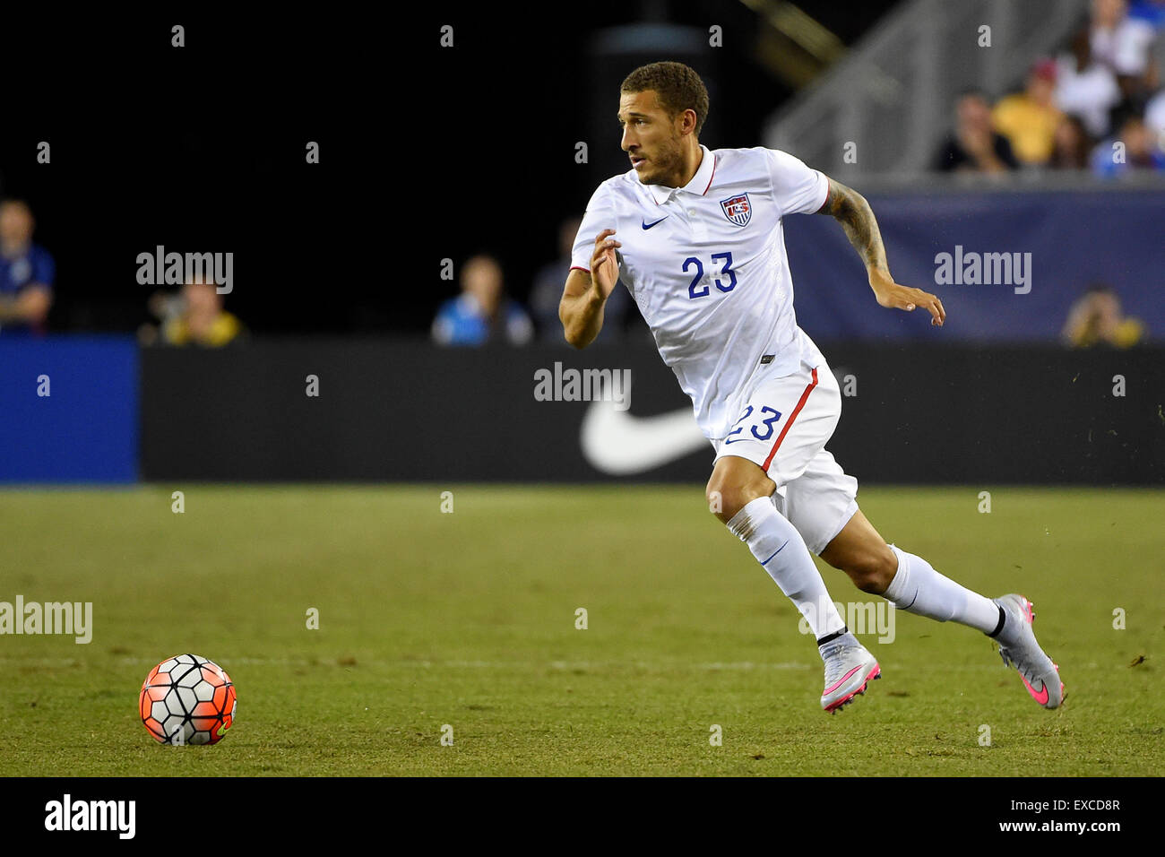 Foxborough, Massachusetts, USA. 10th July, 2015. United States defender Fabian Johnson (23) in game action during the CONCACAF Gold Cup group stage match between USA and Haiti held at Gillette Stadium, in Foxborough Massachusetts. USA defeated Haiti 1-0. Eric Canha/CSM/Alamy Live News Stock Photo