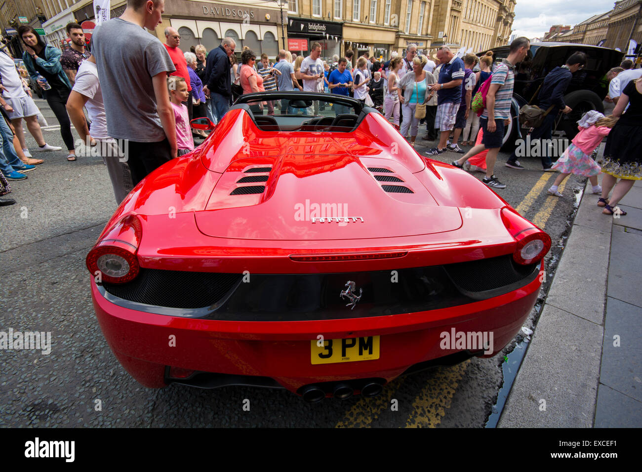 Grey Street, Newcastle, UK. 11th July, 2015. NE1 Cars and crowds at the Newcastle Motor Show Saturday July 11 2015. Credit:  Peter Reed / Alamy Live News Stock Photo