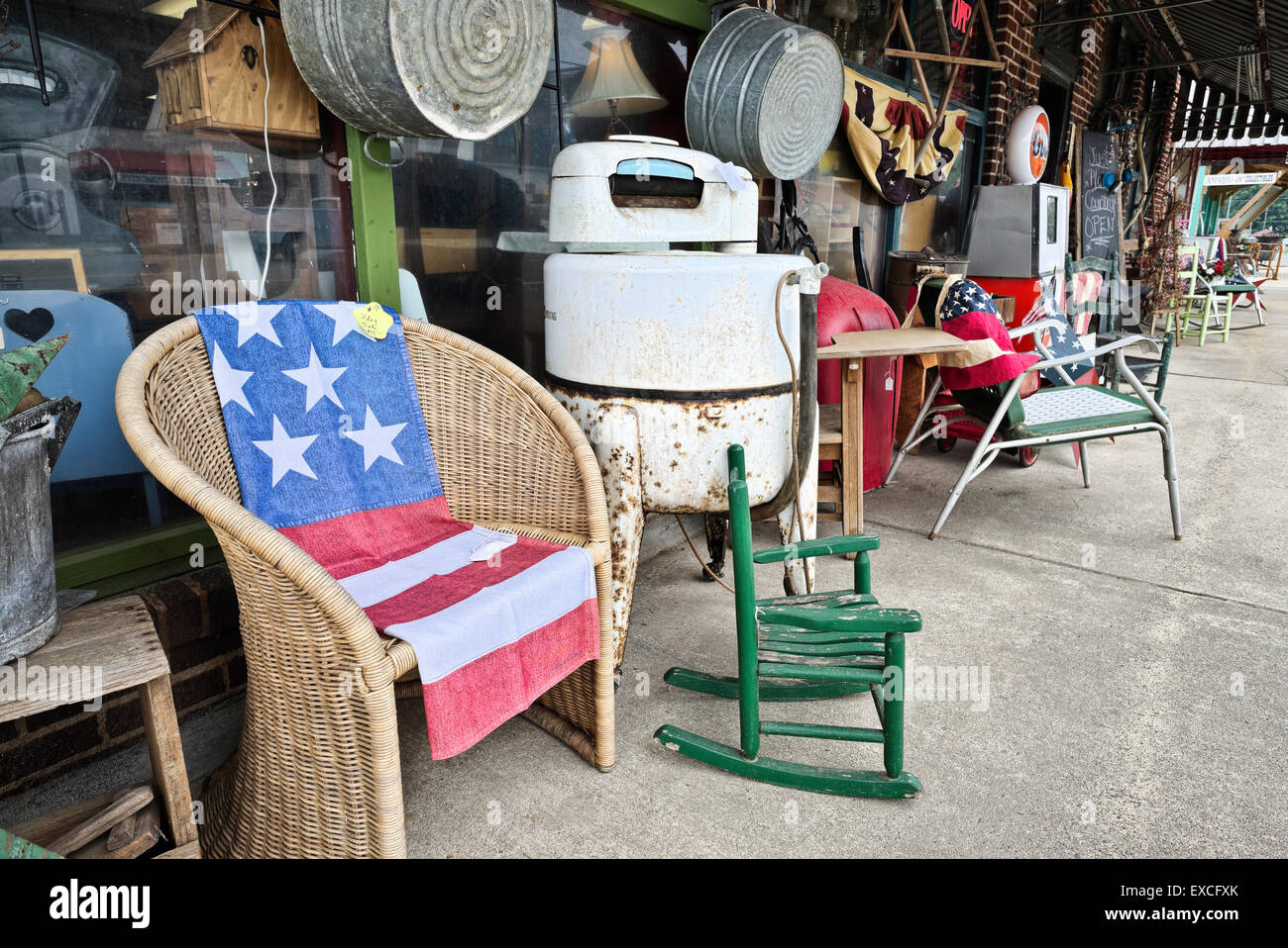 Sidewalk antiques outside antique store Just Plain Country in Walnut Cove, North Carolina Stock