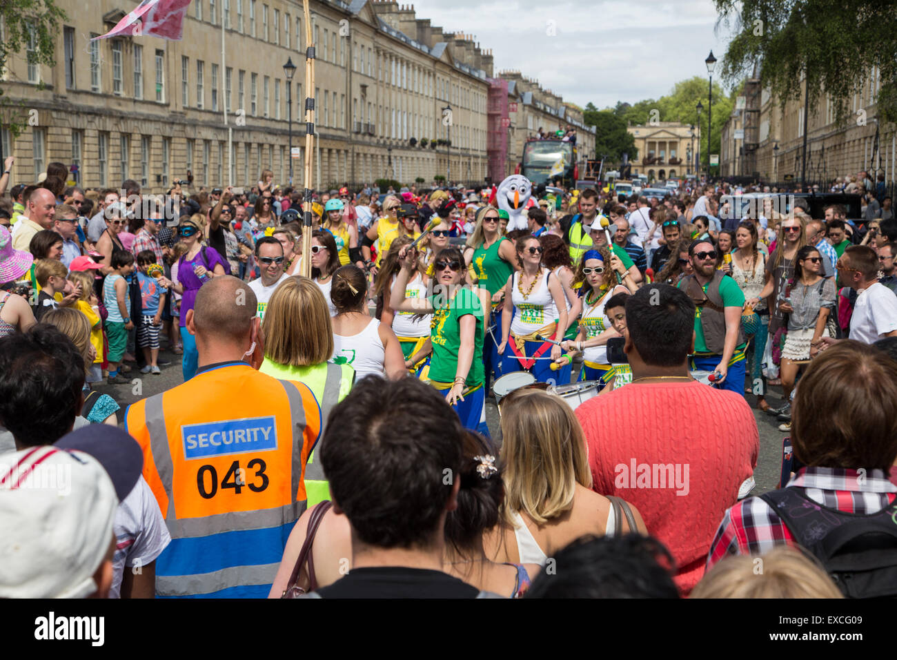 Bath, UK. 11th July, 2015. Hundreds of people line the streets in the ...