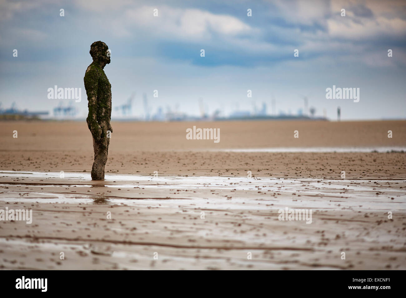 Pictures around Southport   Another Place is a piece of modern sculpture by Antony Gormley. It consists of 100 cast iron sculptu Stock Photo
