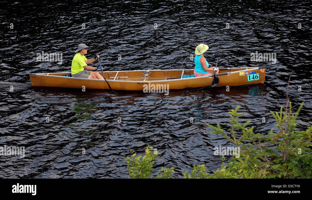 Woman canoe on lake hires stock photography and images Alamy