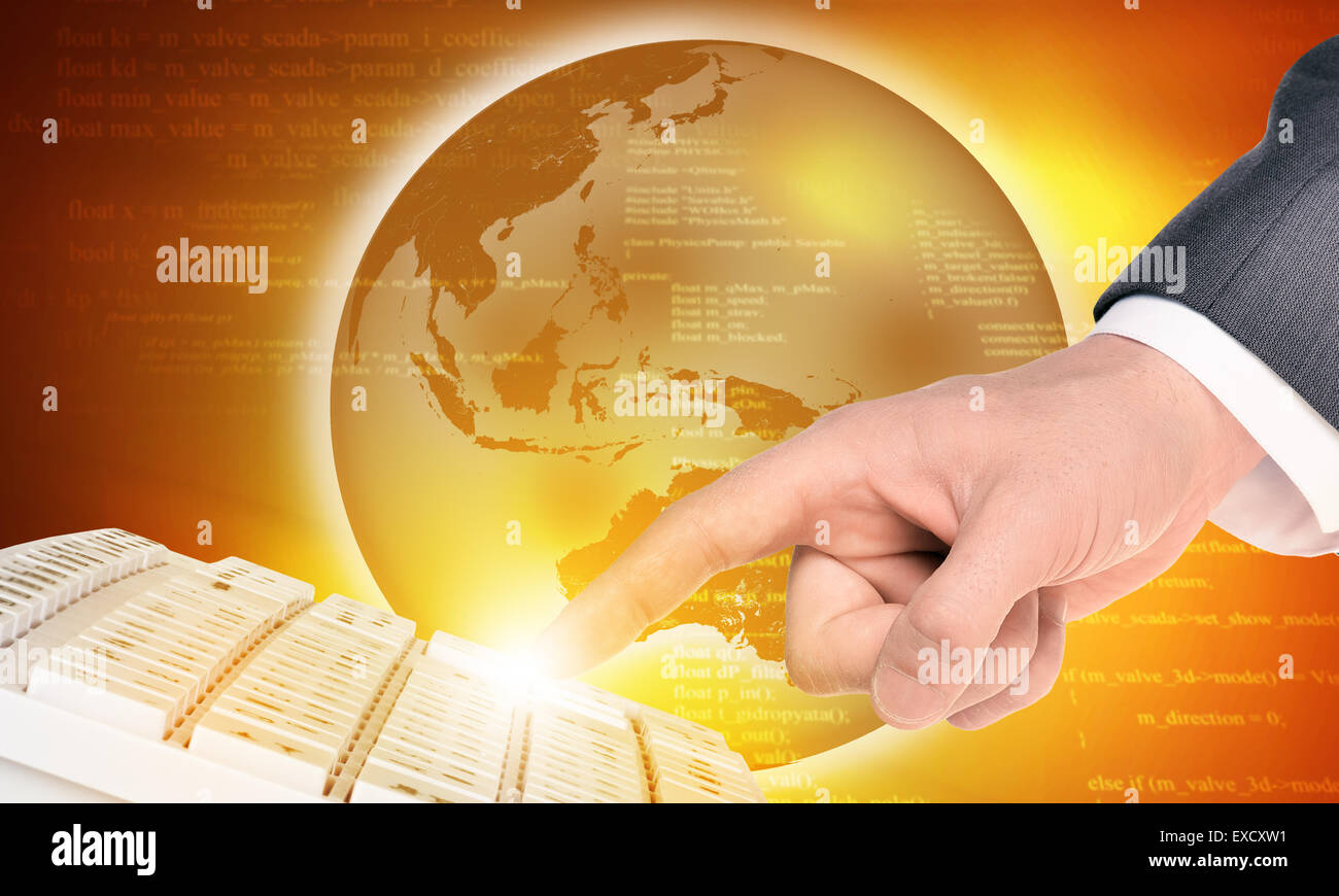 Businessmans finger touching keyboard and Earth Stock Photo