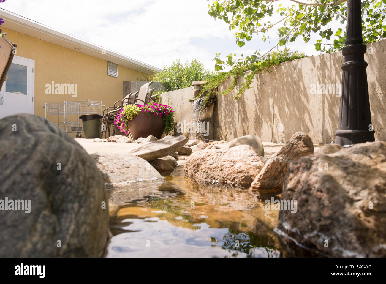 A small man made creek flows through the patio at the Cypress Hills