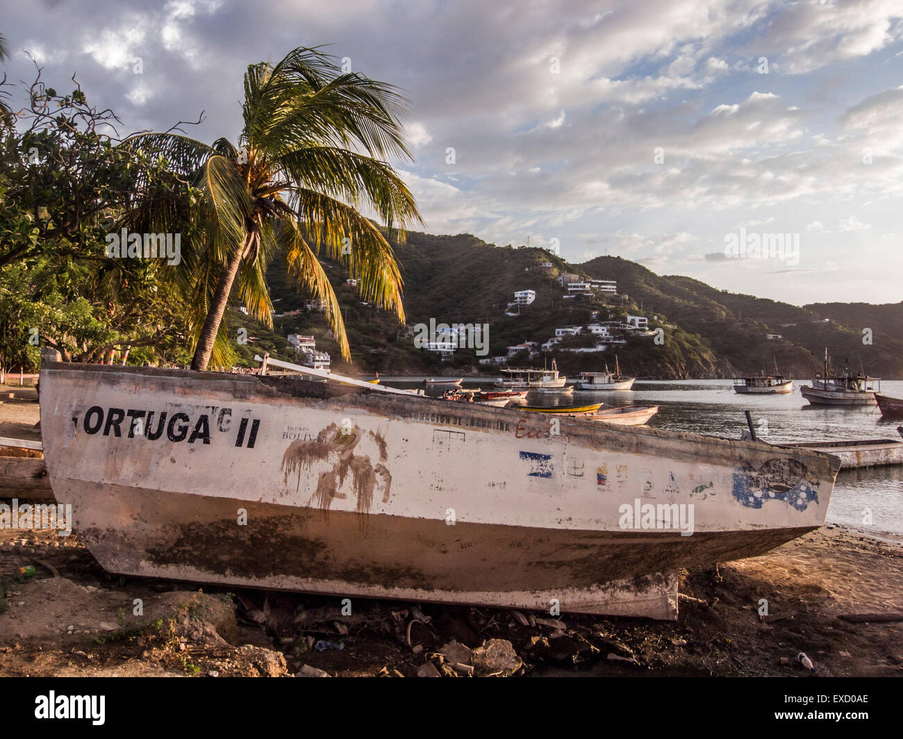 Fishing boat on the beach at Taganga, near Santa Marta, Colombia.  The once small fishing village on the Caribbean has become a Stock Photo