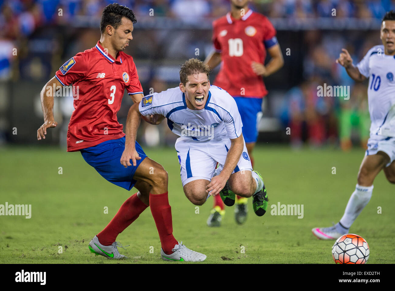 July 11, 2015: El Salvador midfielder Pablo Punyed (20) gets fouled by Costa Rica defender Giancarlo Gonzalez (3) during the 2nd half of an international CONCACAF Gold Cup soccer match between Costa Rica and El Salvador at BBVA Compass Stadium in Houston, TX. The game ended in a 1-1 draw. Credit:  Cal Sport Media/Alamy Live News Stock Photo