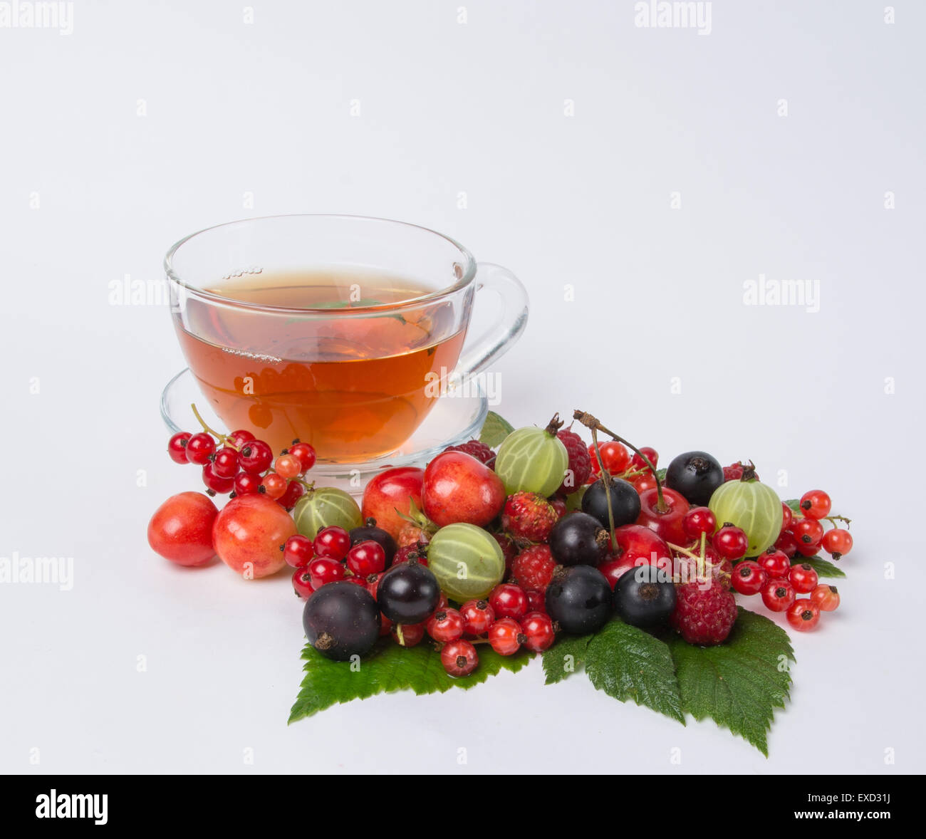 sweet black tea with berry Stock Photo Alamy