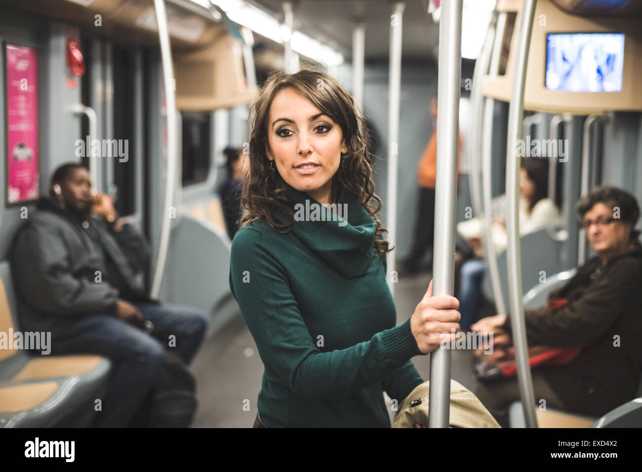 Beautiful woman in the subway hi-res stock photography and images - Alamy