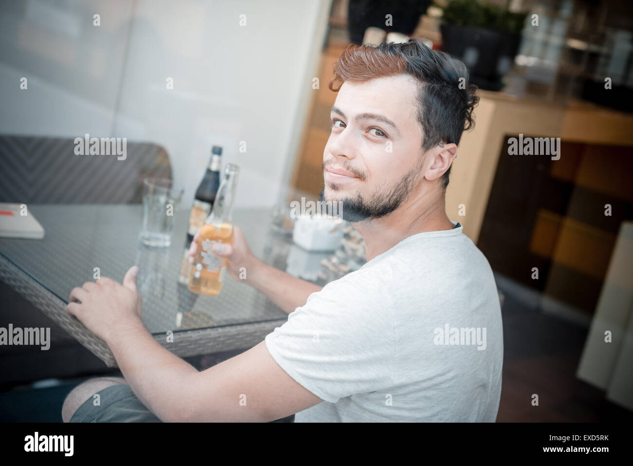 young stylish man at the bar drinking beer Stock Photo - Alamy