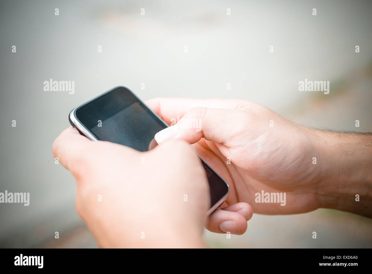 hand with smartphone typing Stock Photo - Alamy