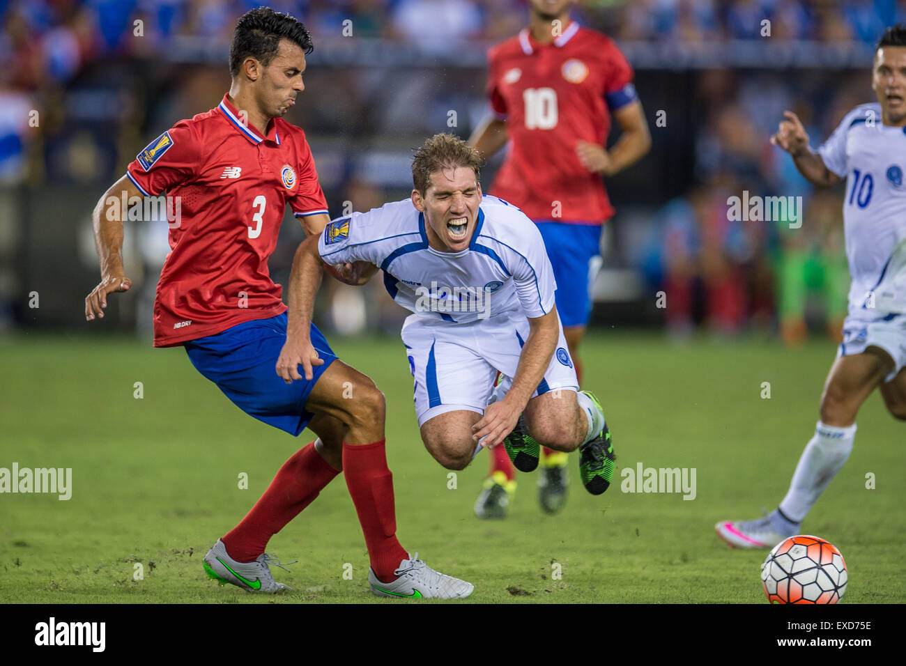 Houston, Texas, USA. 11th July, 2015. El Salvador midfielder Pablo Punyed (20) gets fouled by Costa Rica defender Giancarlo Gonzalez (3) during the 2nd half of an international CONCACAF Gold Cup soccer match between Costa Rica and El Salvador at BBVA Compass Stadium in Houston, TX. The game ended in a 1-1 draw. Credit:  Cal Sport Media/Alamy Live News Stock Photo
