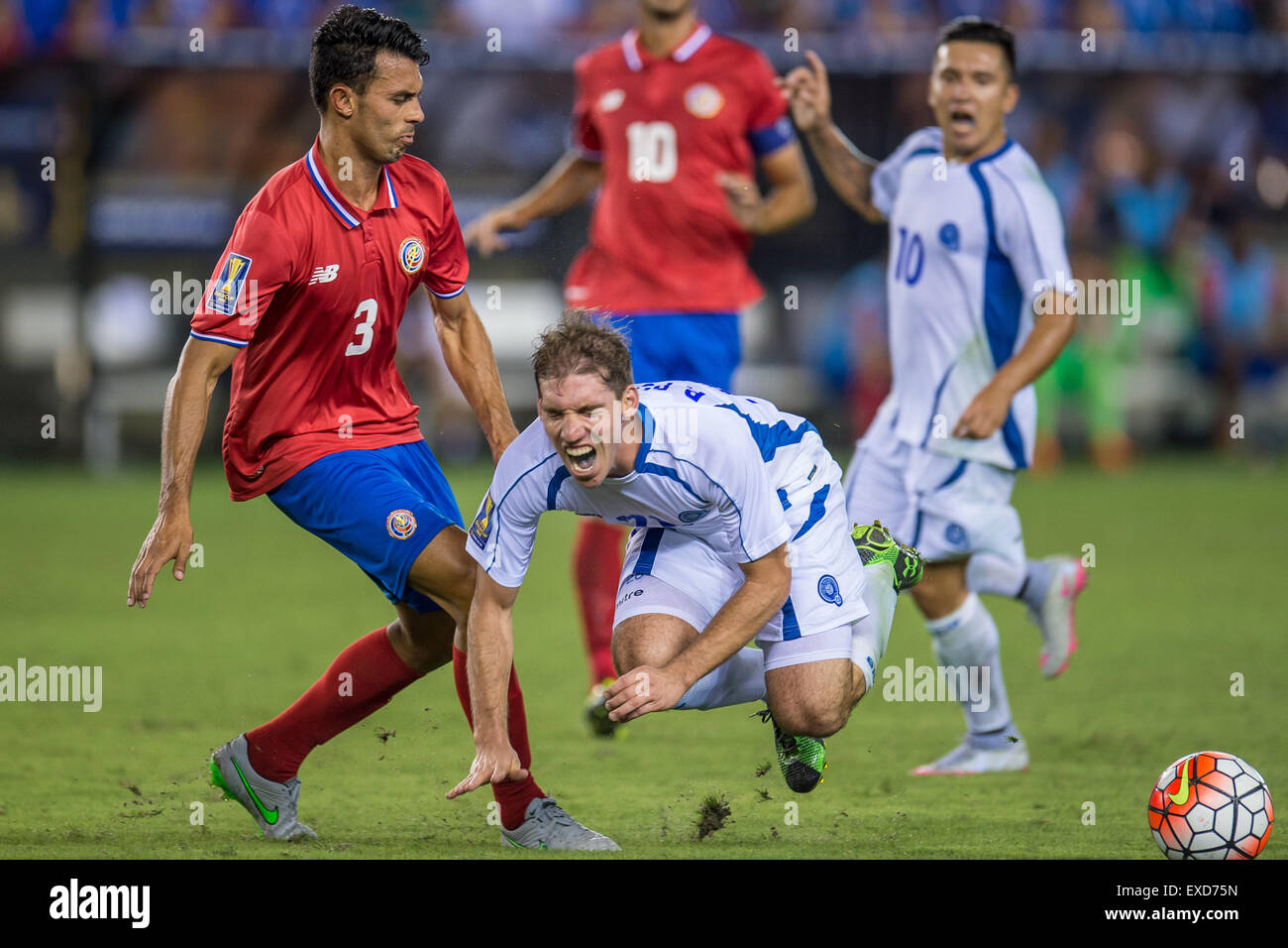 Houston, Texas, USA. 11th July, 2015. El Salvador midfielder Pablo Punyed (20) gets fouled by Costa Rica defender Giancarlo Gonzalez (3) during the 2nd half of an international CONCACAF Gold Cup soccer match between Costa Rica and El Salvador at BBVA Compass Stadium in Houston, TX. The game ended in a 1-1 draw. Credit:  Cal Sport Media/Alamy Live News Stock Photo