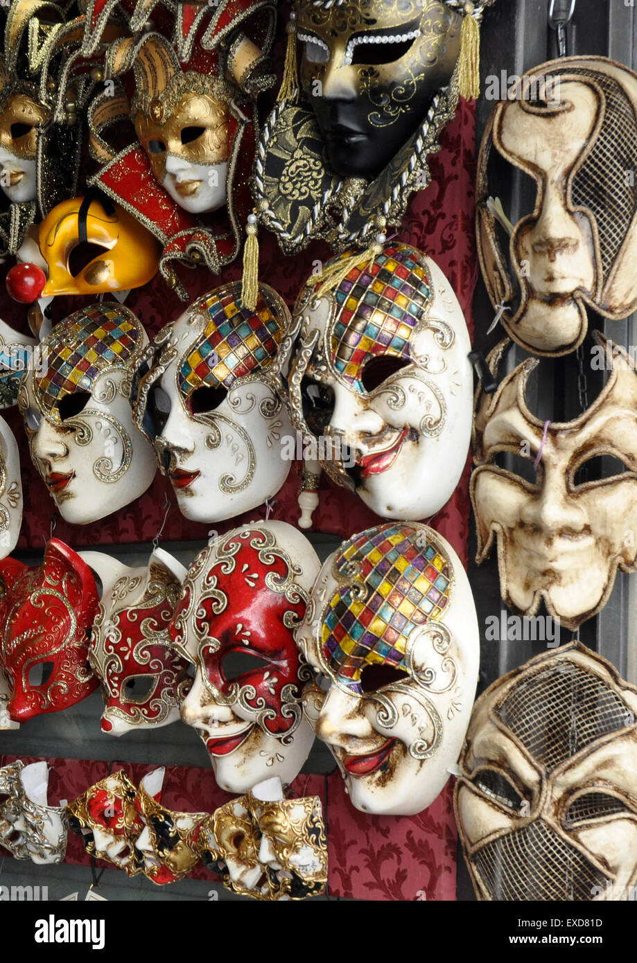 Italy - Venice - Cannaregio region - street market colourful display carnival masks - full of mystery and intrigue Stock Photo