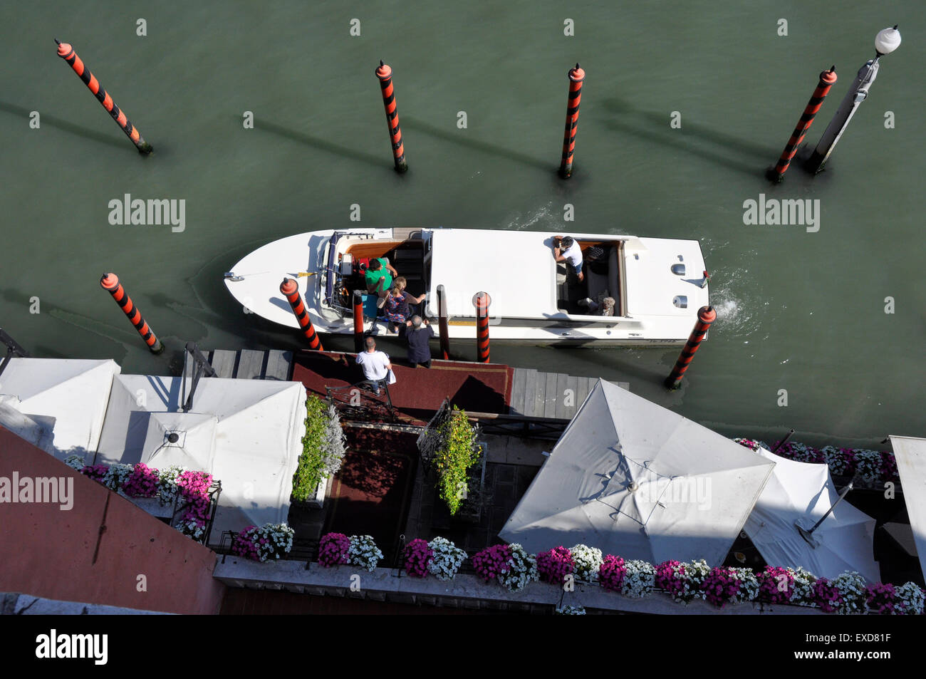Italy -Venice - Cannaregio region - Canale Grande -  hotel landing stage - an arrival by water taxi - graphic - from above Stock Photo