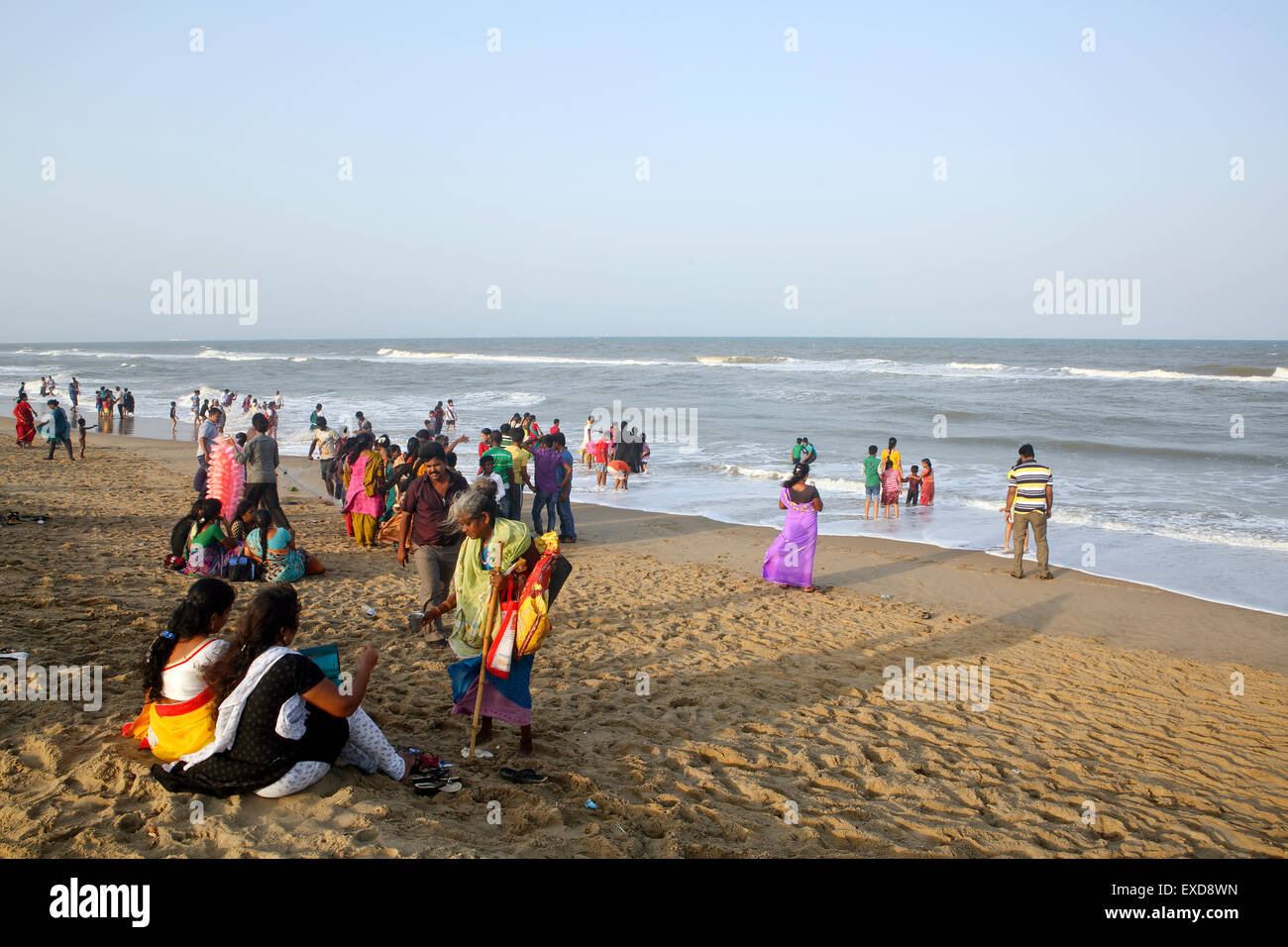 People enjoying time at the beach in Chennai, India Stock Photo