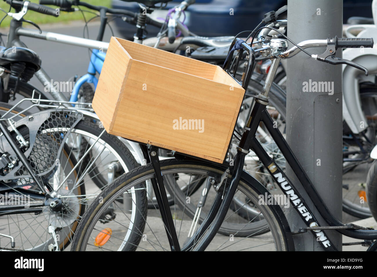 Wooden box being used as cycle basket on bike in Bordeaux France Stock Photo Alamy