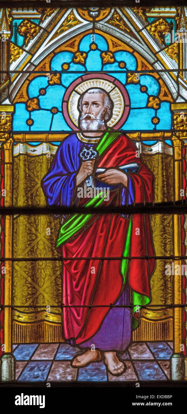 BANSKA BELA, SLOVAKIA - FEBRUARY 5, 2015: The St. Peter the Apostle on the windowpane of St. John the Evangelist church from end Stock Photo