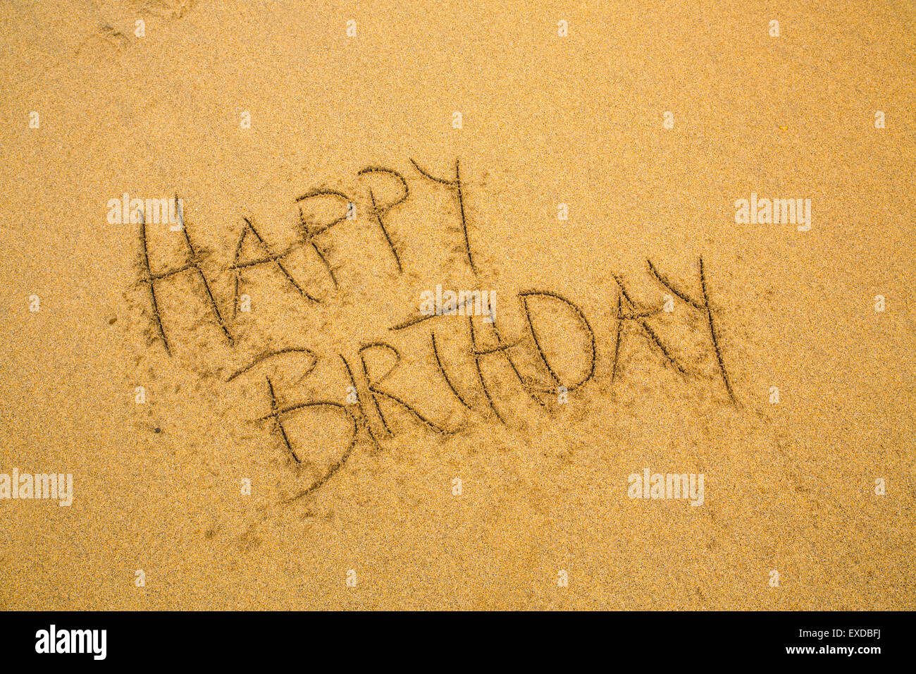 Message in the Sand; Happy Birthday; Cornwall; UK Stock Photo