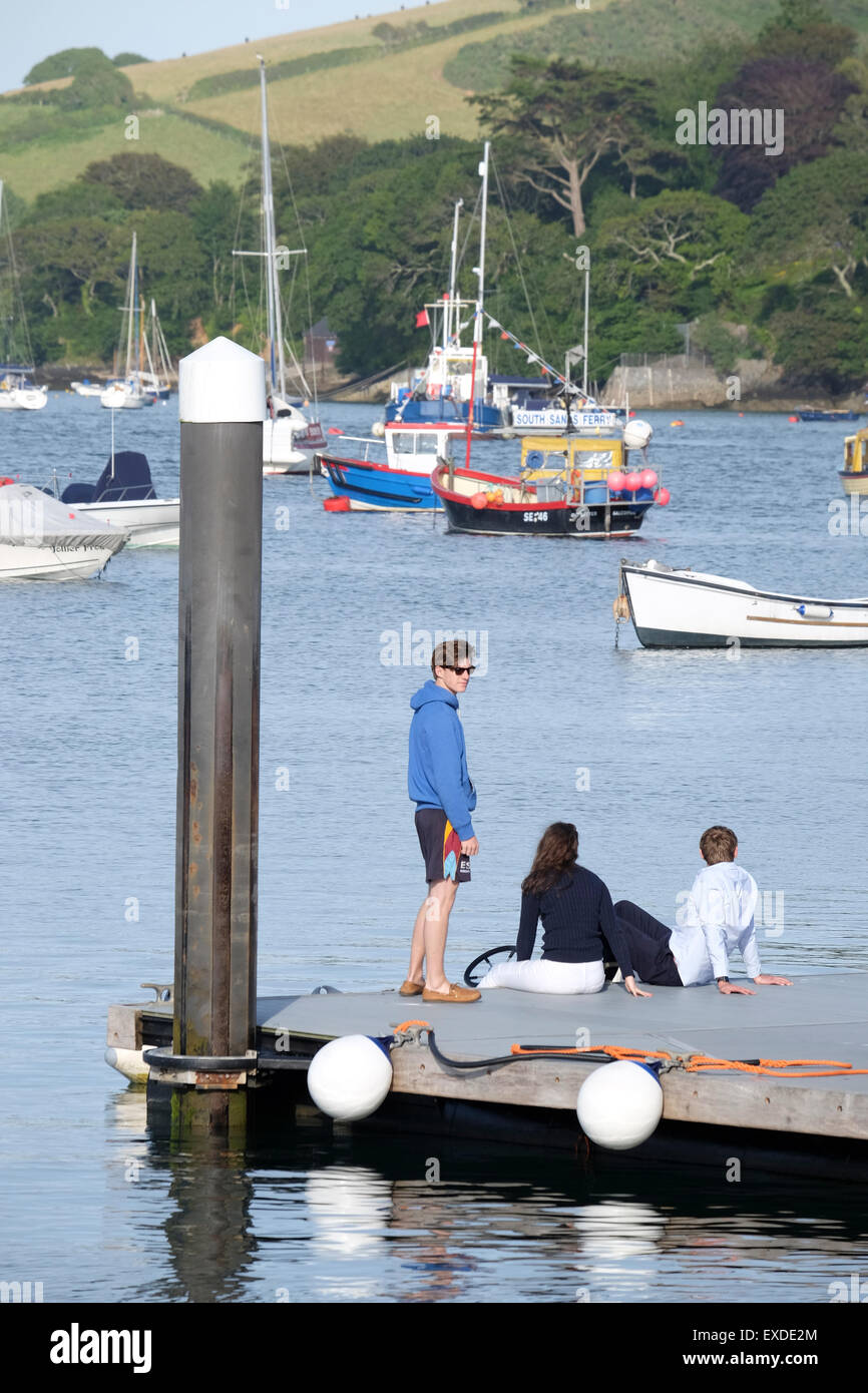 Salcombe Devon. People watching the boats from a Landing stage Stock Photo