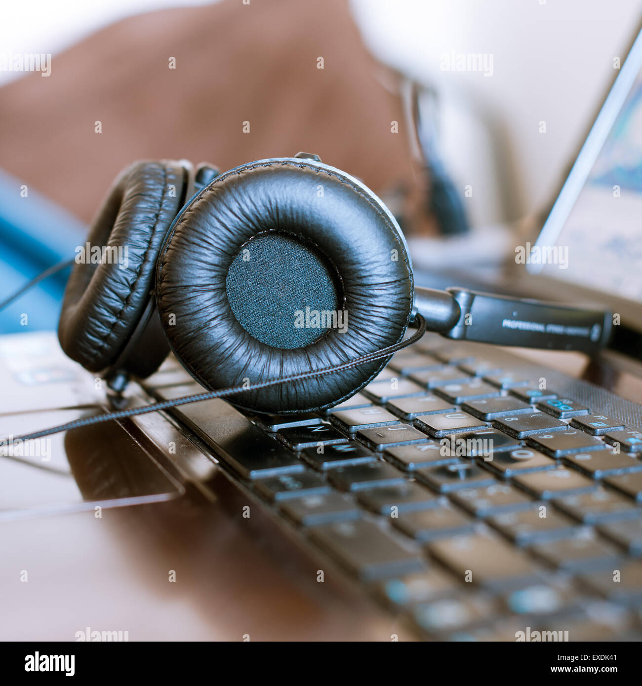headphones on notebook after music mixing Stock Photo Alamy