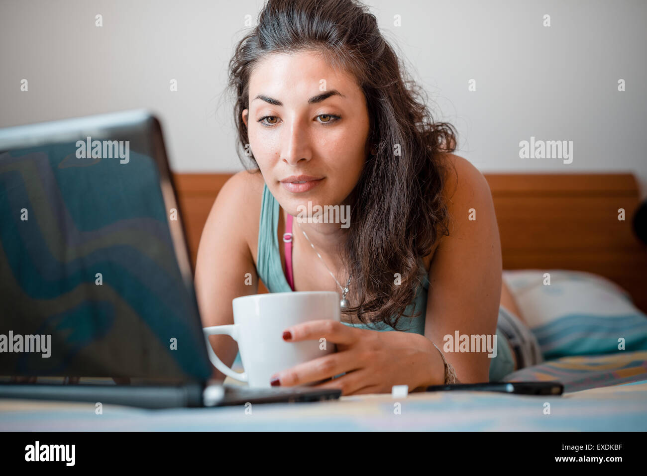 beautiful woman using notebook at home Stock Photo - Alamy