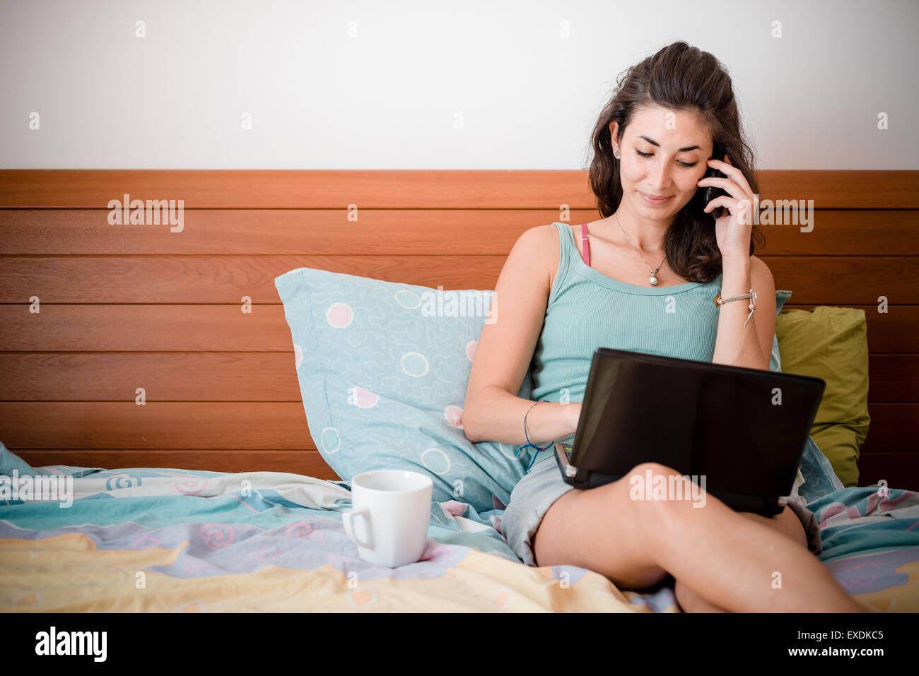 beautiful woman using notebook at home Stock Photo - Alamy