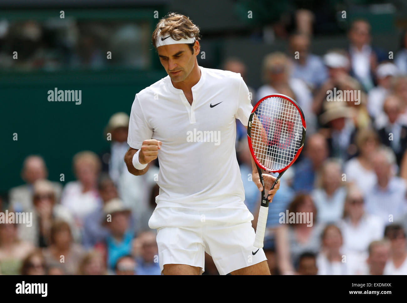 Wimbledon, London. 12th July, 2015. Roger Federer of Switzerland reacts  during men's singles final against Novak Djokovic of Serbia at the 2015  Wimbledon Championships in Wimbledon, southwest London, July 12, 2015.  Credit: