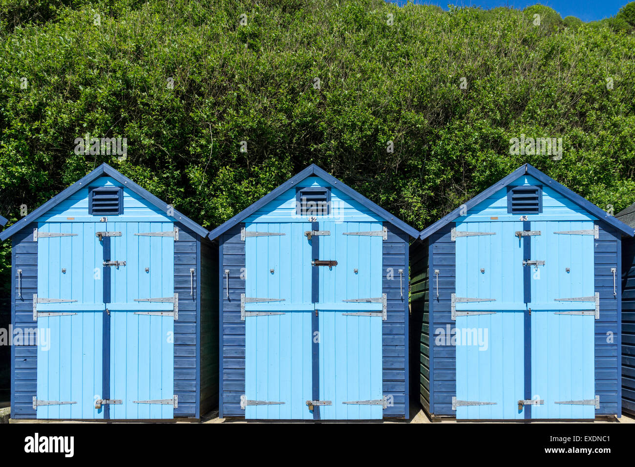 Blue painted beach huts in Swanage, Dorset, UK Stock Photo Alamy