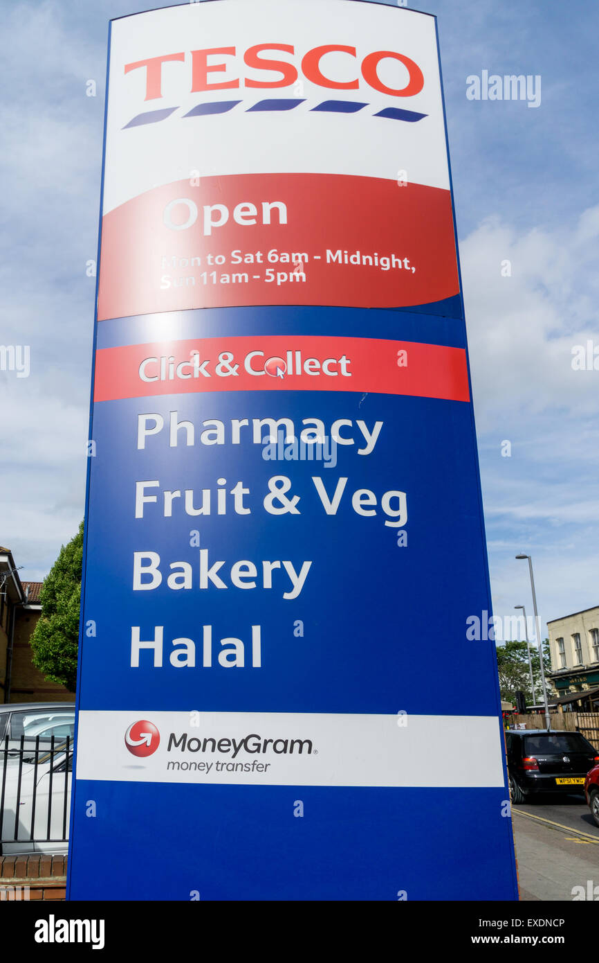 A Tesco signboard advertising that they sell Halal food in Leyton Stock