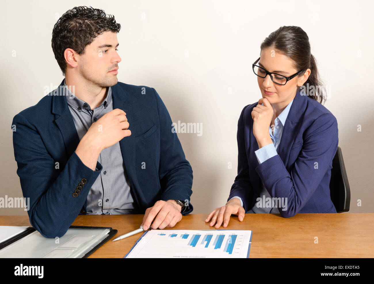 two young business people discussing Stock Photo