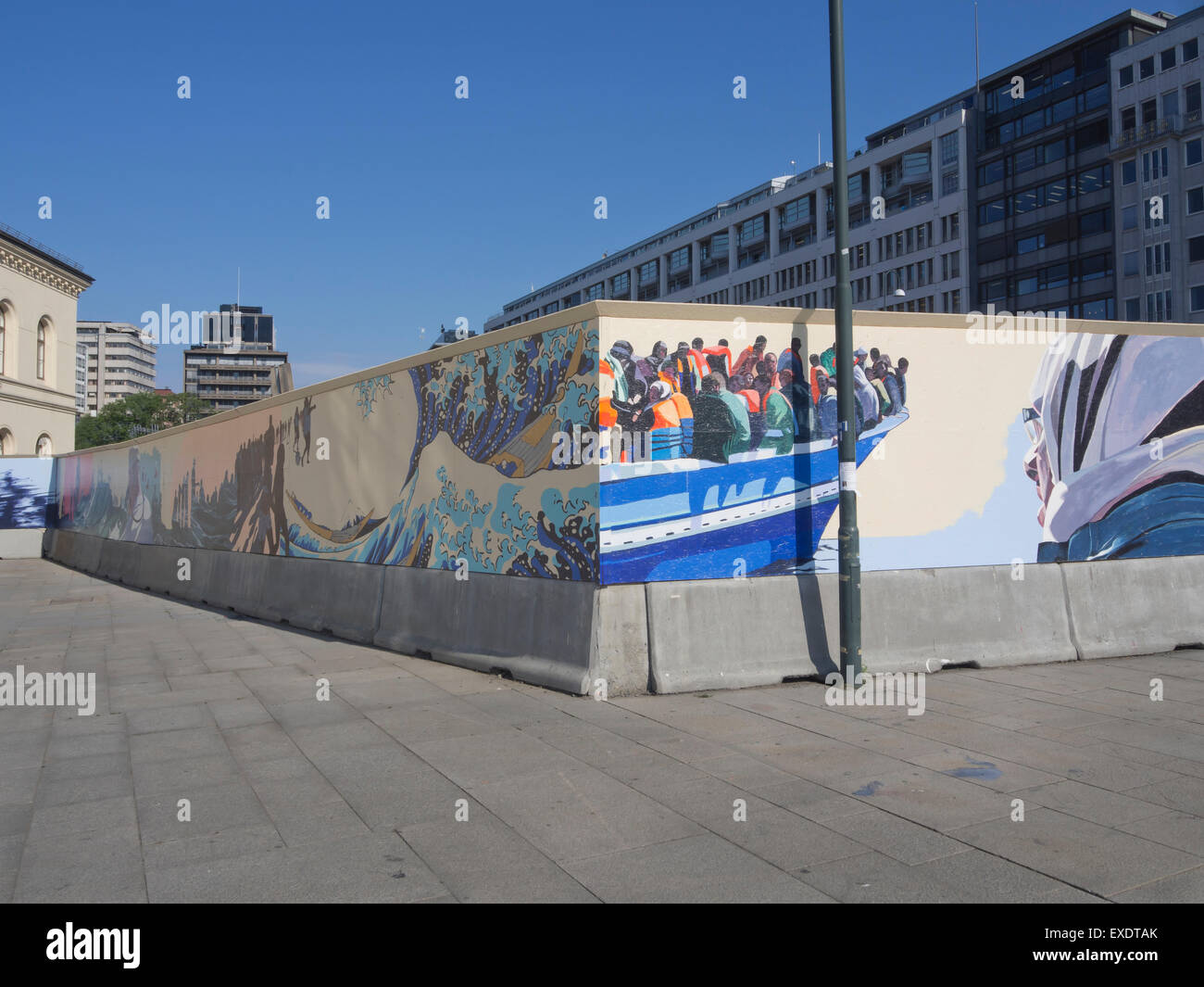 A long, temporary mural in Oslo Norway, Mare Nostrum , depicting the struggles of the boat refugees crossing the Mediterranean sea Stock Photo