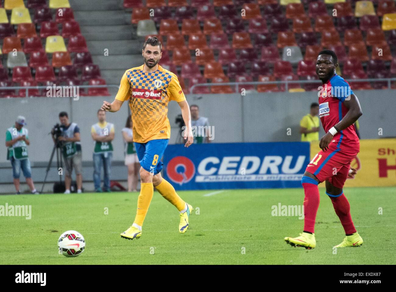 07.03.2013 Bucharest Romania..FC Steaua Bucuresti versus Chelsea Europa  League Football knock-out stages 1/8 finals. John Terry wins a powerful  header with John Obi Mikel Chelsea between Raul Rusescu(L) and Leandro Tatu  (r)