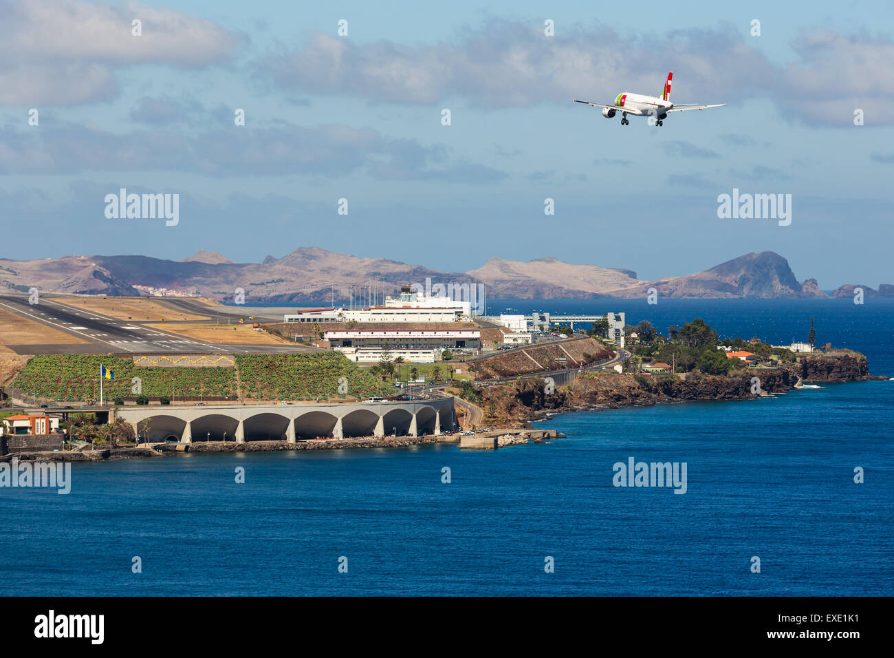 Boeing 737 is approaching Funchal Airport at Madeira, Portugal Stock Photo